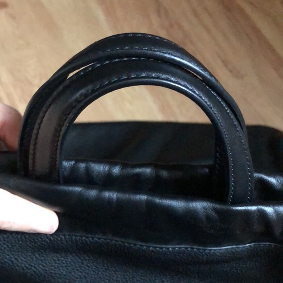 Authentic Gucci drawstring leather backpack in black - Picture 12 of 14